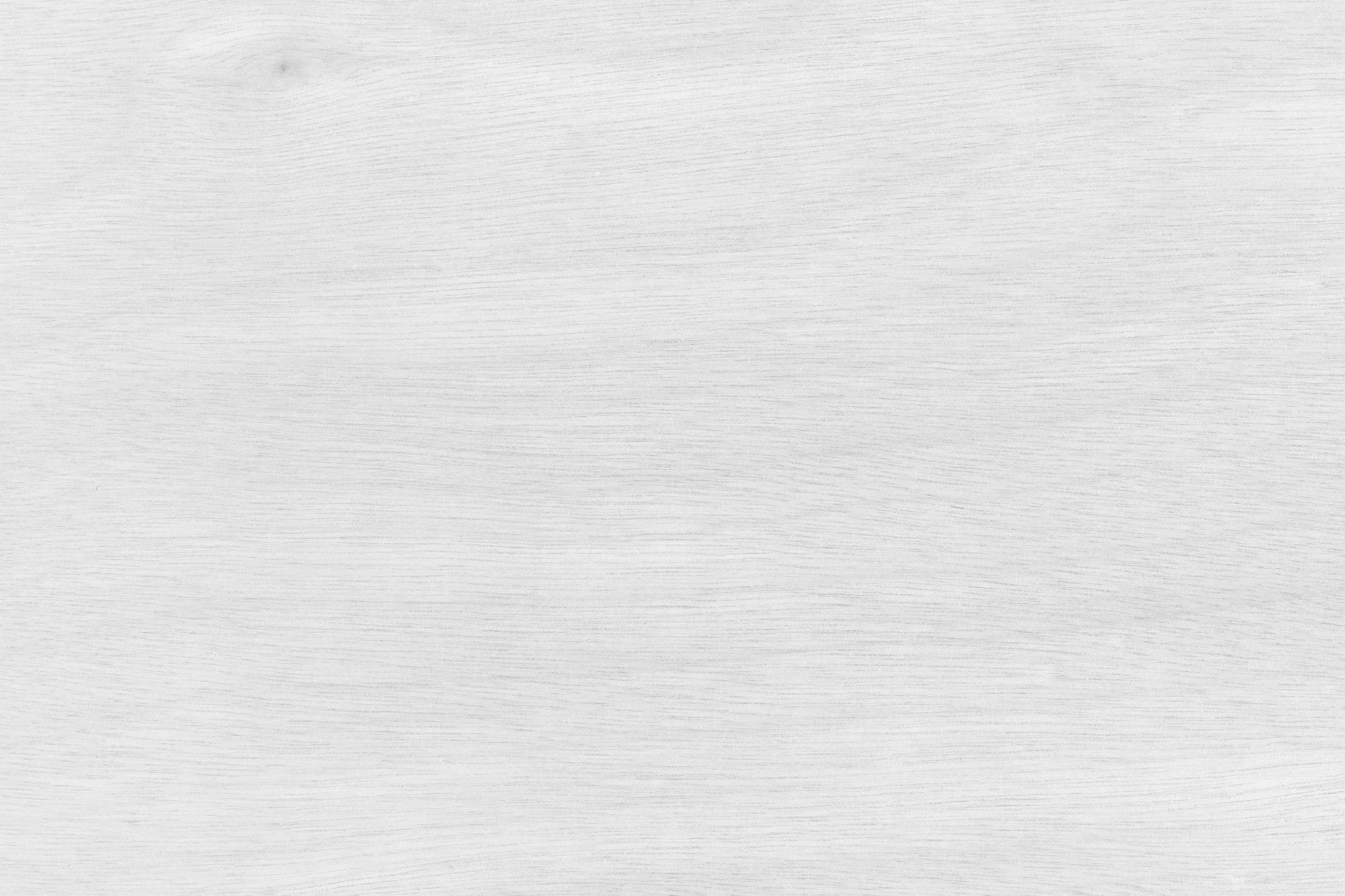 The Oslo A close-up view of a white wood texture background, showcasing the natural grain and subtle variations in color.